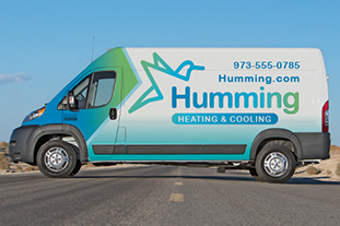 humming heating air conditioning home services truck wrap design